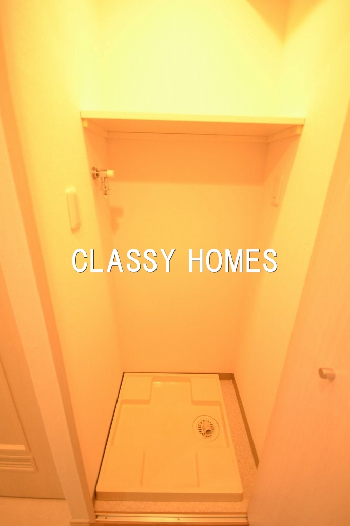 その他設備　2004年竣工　グランド・ガーラ三田：洗濯機置き場