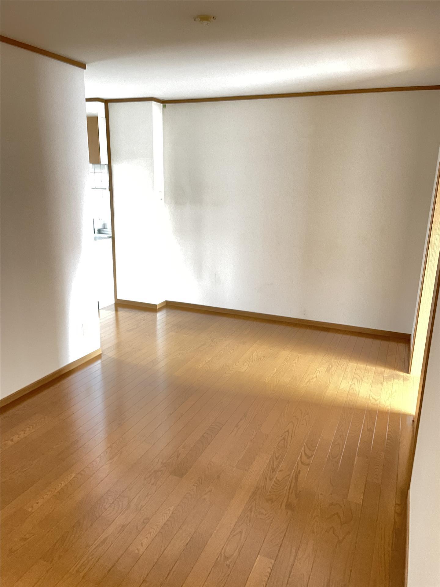 アメニティタウンIIの居間写真