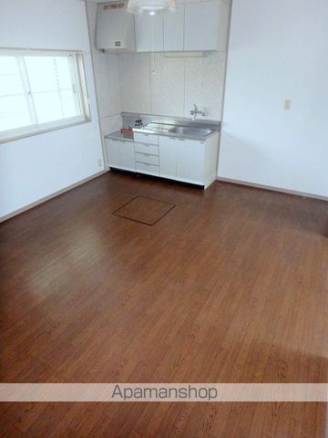 サンシャインOKAの居間写真