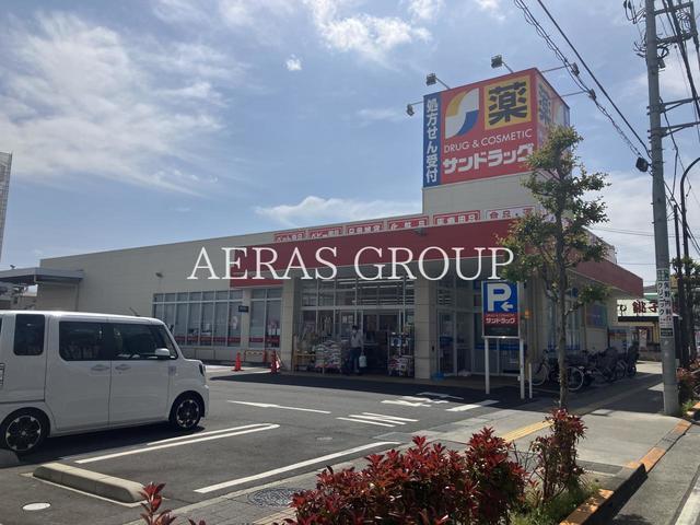 ドラックストア　サンドラッグ 西新井店（ドラッグストア）まで342m