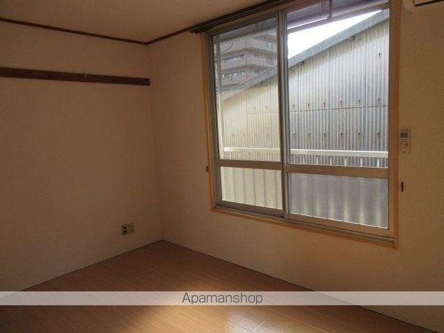ベルハイツ西市の居間写真