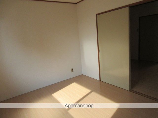 ベルハイツ西市の居間写真