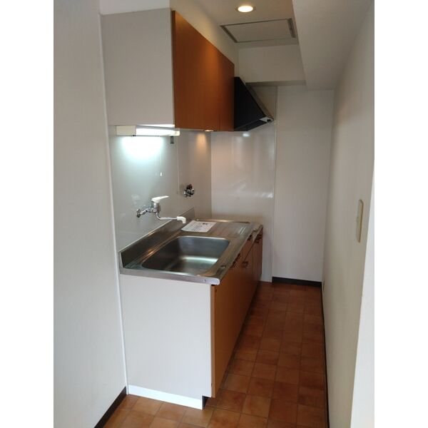 キッチン　※写真は同じマンションの違う部屋のものになります。