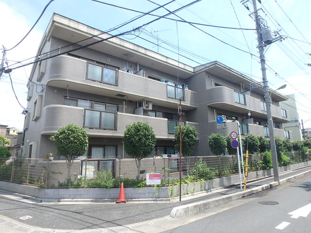 建物外観　南西向き・外観タイル張りのマンションです！