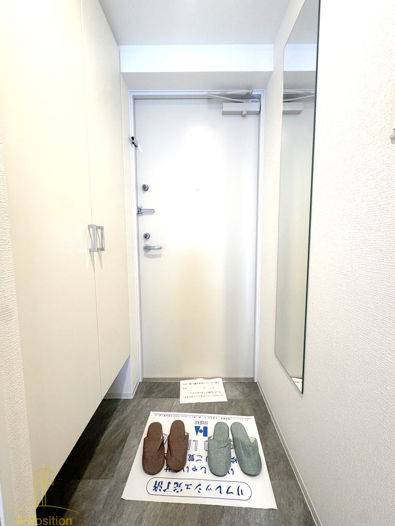 玄関　セレニテ難波グランデノール