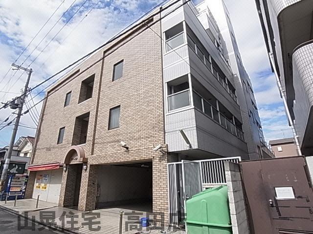 【大和高田市西三倉堂のマンションの建物外観】