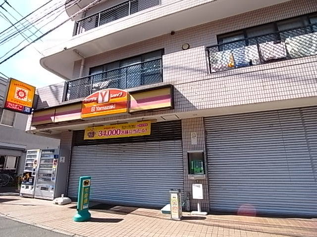 コンビニ　ヤマザキショップてづか（コンビニ）まで390m