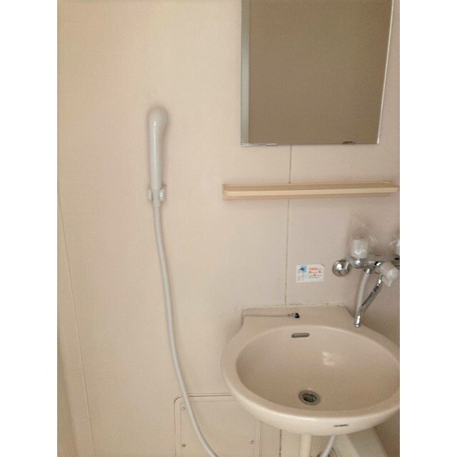 洗面設備　※写真は他のお部屋のものです。