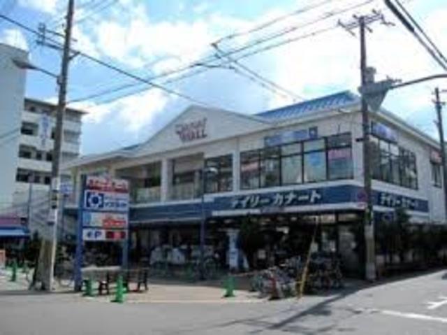 スーパー　デイリーカナートイズミヤ西田辺店（スーパー）まで576m