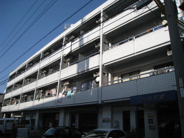 【広島市西区楠木町のマンションの建物外観】