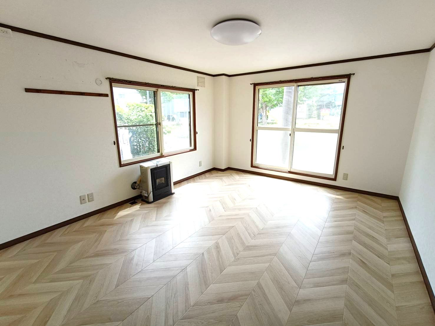 篠路7条6丁目 戸建の居間写真