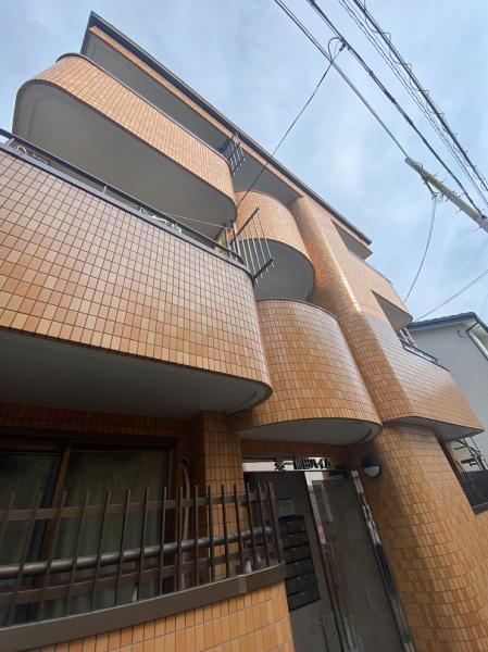 寝屋川市萱島本町のマンションの建物外観