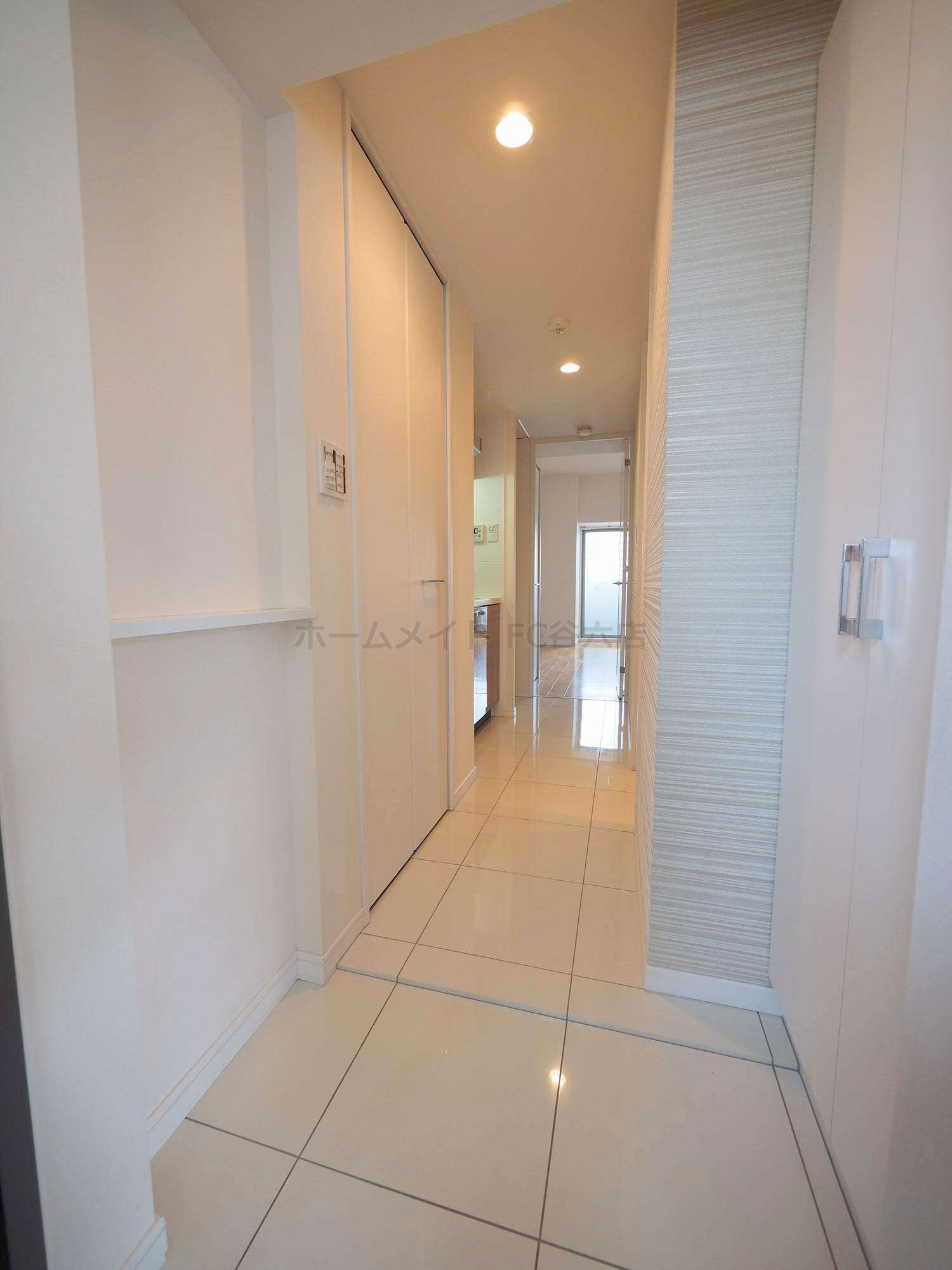 玄関　エスライズ梅田DOSHIN