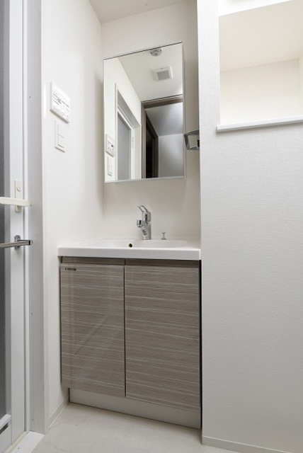 洗面設備　※別タイプの参考画像になります。