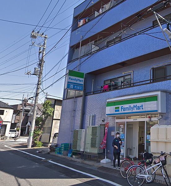 コンビニ　ファミリーマート　亀山西新井本町店（コンビニ）まで561m