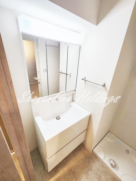 洗面設備　スペースが確保できる洗面所です