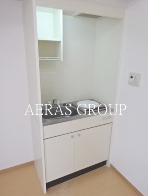 マンション里のキッチン写真