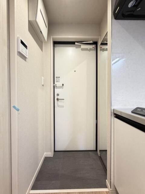 玄関　同間取り別部屋の写真です。