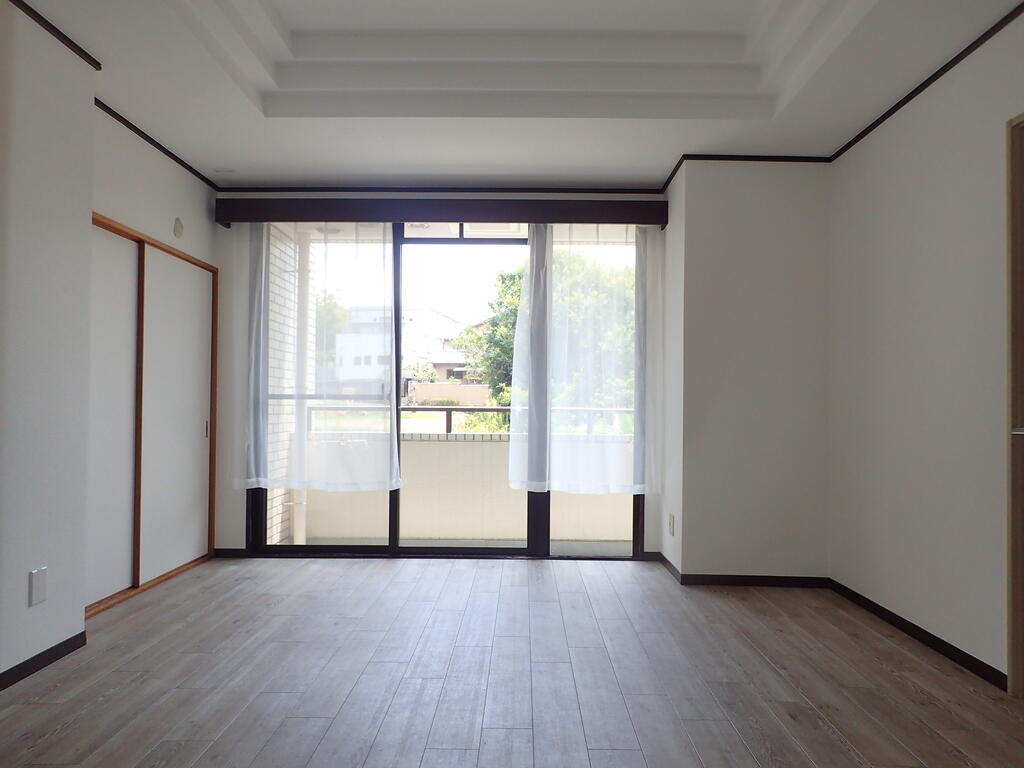 ライオンズマンション檜尾の居間写真