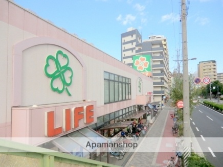 スーパー　ライフ十三東店（スーパー）まで380m