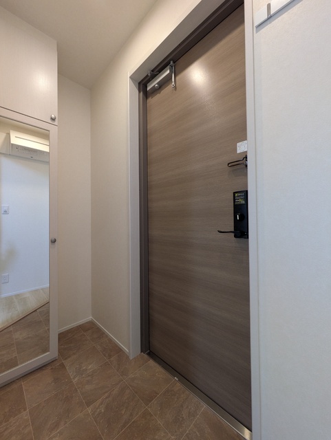 玄関　※建築施工中の写真です。