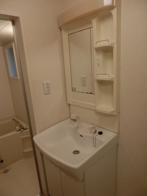 洗面設備　※別部屋の参考写真です。
