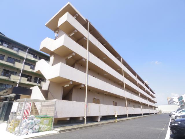 【橿原市葛本町のマンションの建物外観】