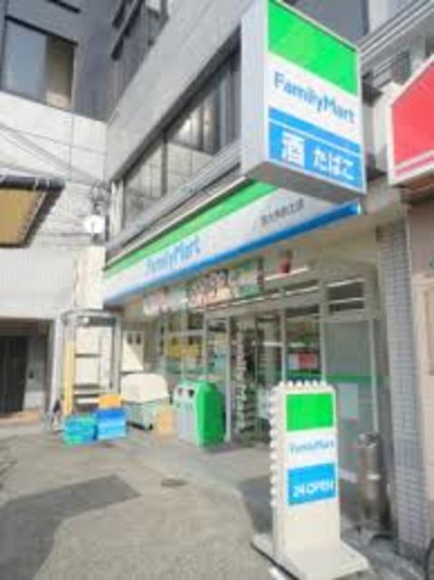 コンビニ　ファミリーマート西九条駅北店（コンビニ）まで422m