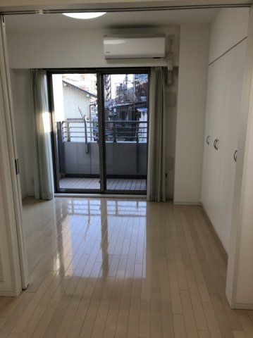 グローリオ新中野ブランデコの居間写真