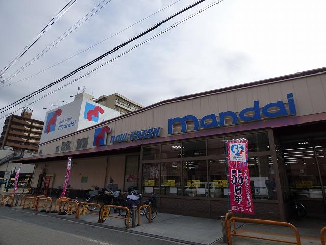 スーパー　万代（スーパー）まで769m