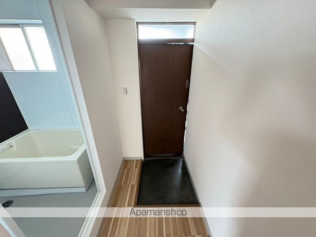 京阪本線 萱島駅 徒歩6分 3階建 築59年の玄関写真