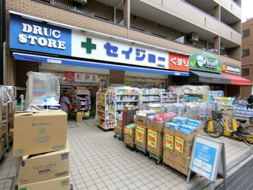 ドラックストア　くすりセイジョー稲田堤店（ドラッグストア）まで498m