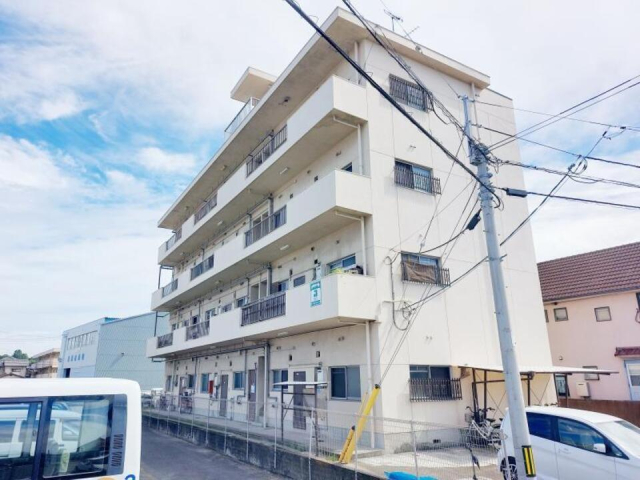 松山市古三津のマンションの建物外観