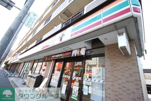 コンビニ　セブンイレブン船橋塚田駅前店（コンビニ）まで590m