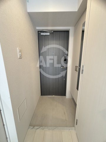 玄関　エスリード弁天町桜通レジデンス