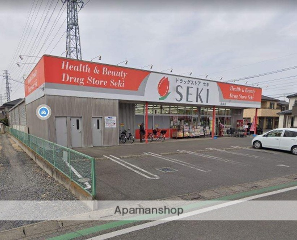 ドラックストア　ドラッグストアセキ東間店（ドラッグストア）まで381m