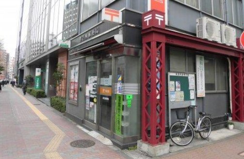 郵便局　港芝四郵便局（郵便局）まで873m