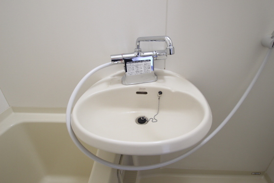 洗面設備　※別の部屋の写真です