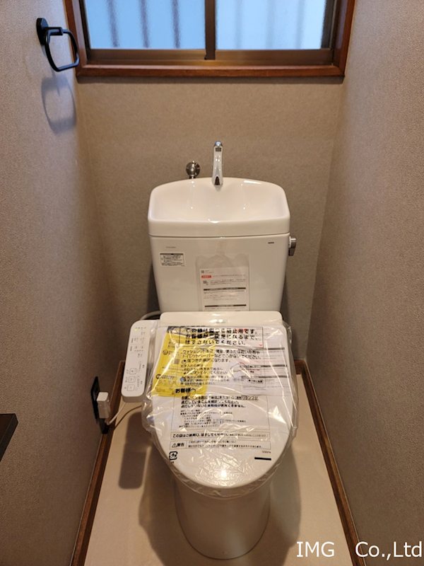 弥十郎戸建てのトイレ写真