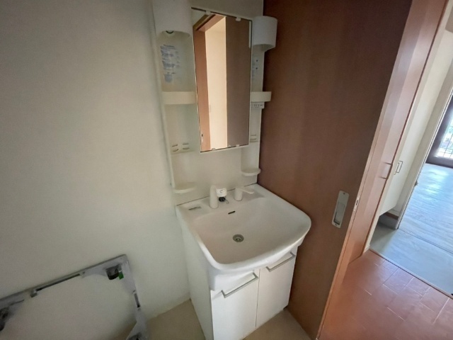 洗面設備　※１０１号室の写真です。