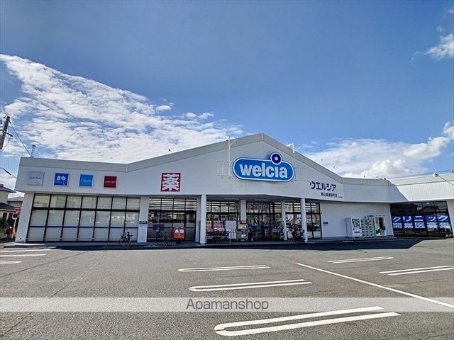 ドラックストア　ウエルシア岡山築港新町店（ドラッグストア）まで423m