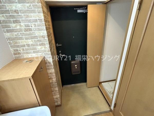 地下鉄長堀鶴見緑地線 鶴見緑地駅 徒歩5分 3階建 築24年の玄関写真