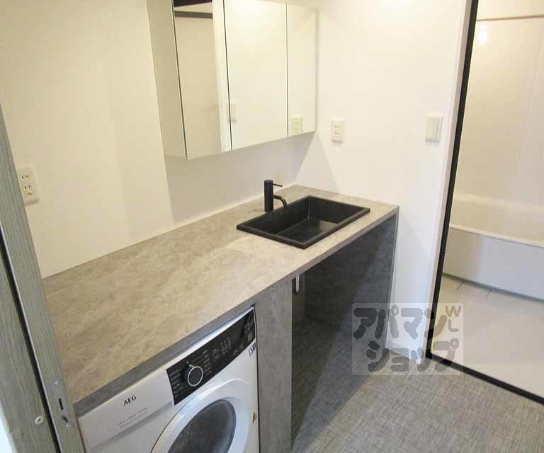 洗面設備　２０２号室の写真です。