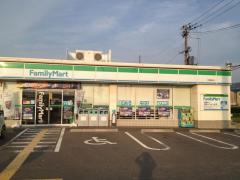 コンビニ　ファミリーマート四条畷駅前店（コンビニ）まで474m