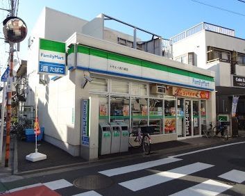 コンビニ　ファミリーマートトウエイ西六郷店（コンビニ）まで410m