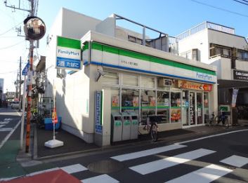 コンビニ　ファミリーマートトウエイ西六郷店（コンビニ）まで379m