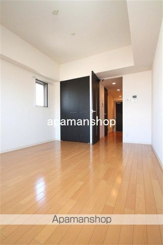 地下鉄長堀鶴見緑地線 ドーム前千代崎駅 徒歩4分 11階建 築19年の居間写真