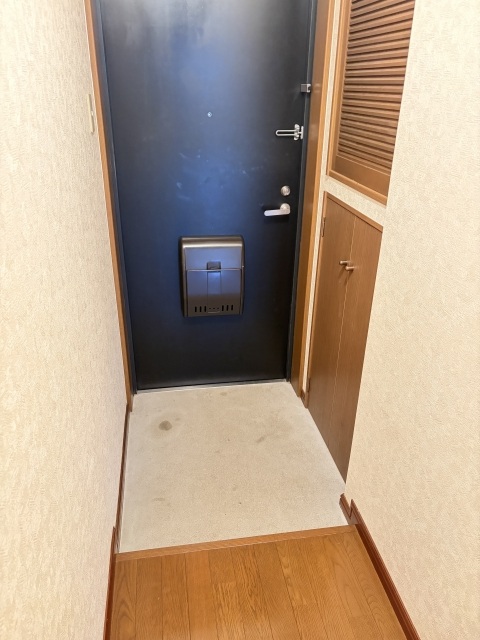 ウエルス大学町の玄関写真