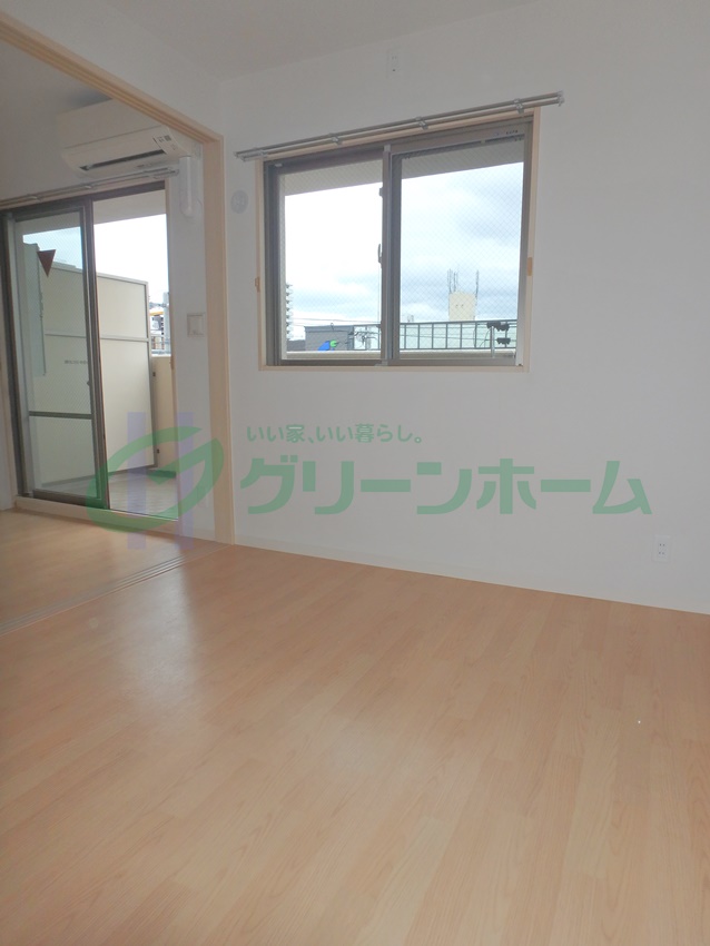 地下鉄千日前線 新深江駅 徒歩3分 10階建 築12年の居間写真