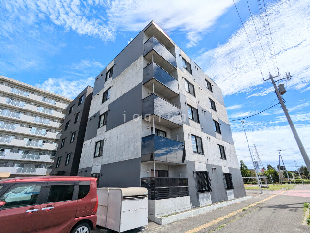 ＭＡＮＤＡＲＩＮ　ＭＥＧＵＭＩＮＯ（マンダリン恵み野）の建物外観